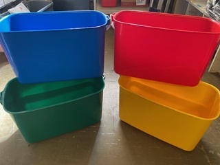 Bucket printed with Caution Window Cleaner working 